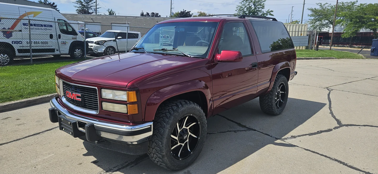 Red pickup truck at DY Autobody & Paint in St. Catharines